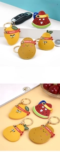Macro shot of fruit-shaped PU leather AirTag covers and keychain accessories