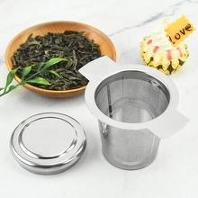Close-up of 304 stainless steel tea infuser with fine mesh on a marble countertop
