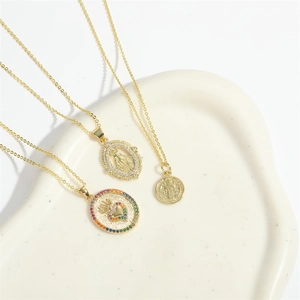 Golden vintage cross necklace set with Madonna relief and colorful heart crown charms