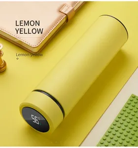 Close-up of smart vacuum flask LED screen showing temperature in lemon yellow color