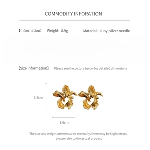 Detailed chart showing golden flower earrings dimensions of 3.4cm and silver needle specs