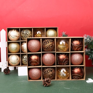 Detail of Christmas ornament set with champagne gold and rose gold baubles in festive decor