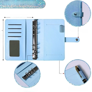 Blue glitter A6 binder showing internal card slots, metal rings and buckle closure detail