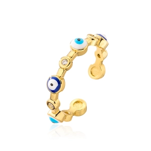 Detailed macro view of gold plated evil eye ring with blue enamel and zircon stones