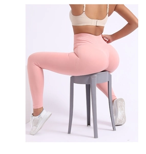 Detailed back view of pink seamless yoga leggings showing high waist and push-up effect