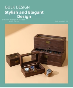 Detail view of walnut wood grain watch box with clear glass lid and vintage metal clasp