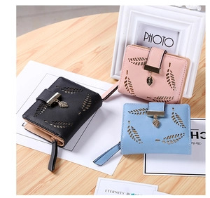 Short faux leather leaf-cut wallets for women with metal charms and snap closure