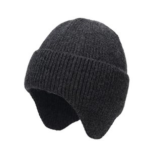 Dark gray knitted earflap beanie with thick ribbed texture for winter warmth