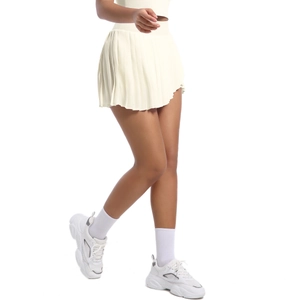 Detail of high-waisted pleated tennis skirt fabric and professional pleated hem design