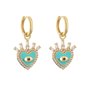 Detail of gold heart earrings with evil eye enamel and shimmering zircon crystals