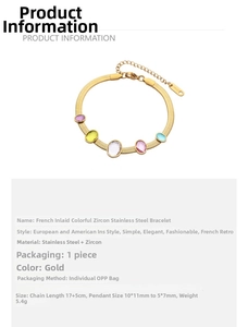 Detail view of 18k gold plated snake chain with colorful oval zircon stones and extender