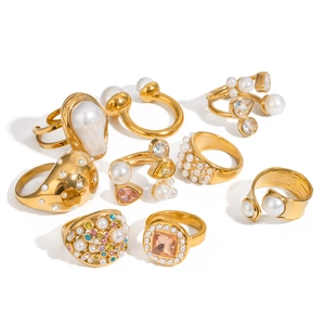 Exaggerated gold stainless steel rings set with artificial pearls and colorful rhinestones