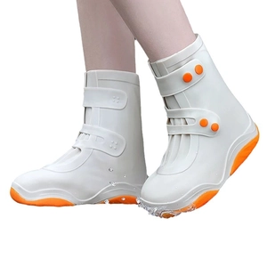 Waterproof silicone rain shoe covers with thick orange anti-slip soles and high-top design