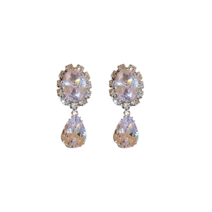 Sparkling silver dangle earrings with pear-shaped clear zircon drop stones
