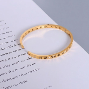 Elegance 18k gold plated stainless steel bangle featuring Roman numerals and zircon stones