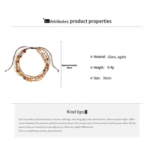 Detail van meerlaagse boho-armband met glazen agaatkralen en verstelbaar trekkoord