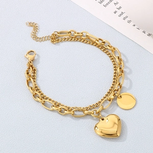 Double-layered 18K gold plated stainless steel bracelet with heart and round charms