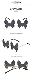 Detail view of rimless butterfly sunglasses with grey lenses and gold metal temples