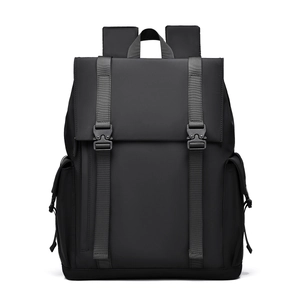 Modern black nylon backpack with dual buckle flap closure and side pockets on white background
