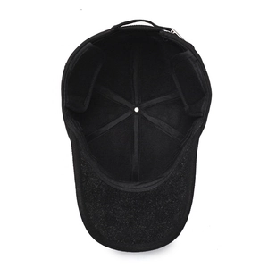 Men's winter baseball cap with earflaps and warm lining shown from an interior angle