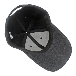 Detail view of dark grey wool baseball cap showing inner lining and adjustable strap