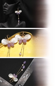 Detail of butterfly pearl earrings with 18K gold plating and long purple tassels