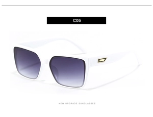 Close-up of white square sunglasses with purple gradient lenses and gold metal temple detail