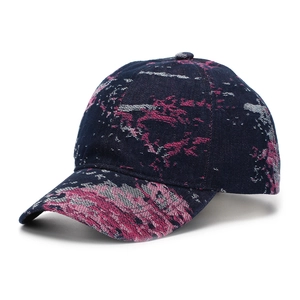 Detail of blue and pink tie-dye jacquard baseball cap with durable cotton twill texture