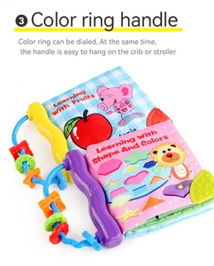 Detail of baby cloth book with colorful sliding rings and hanging handle for early learning