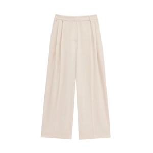 Détails du pantalon large beige à taille haute avec plis élégants et tissu au beau tombé