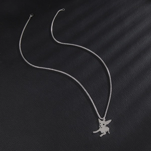 Silver chihuahua dog pendant necklace with elegant box chain on black leather background