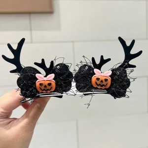 Cute Halloween antler hair clips with black sequins and pumpkin charm for kids party