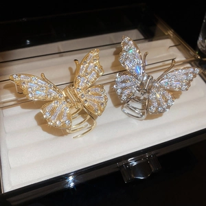 Elegant butterfly hair claw clips with rhinestones in gold and silver finish