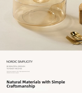 Detailed close-up of amber glass salad bowl with elegant gold metallic accents