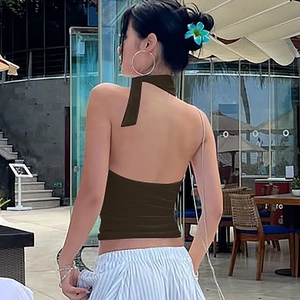 Detail view of a slim fit dark brown backless halter neck top for women in summer