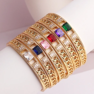 Golden chain link cuff bracelet featuring multi-color rectangular zircon stone inlays