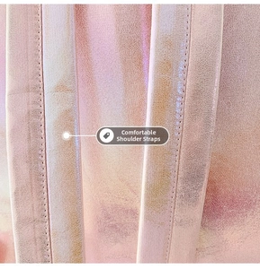 Close-up of holographic mermaid backpack detail featuring comfortable pink shoulder straps