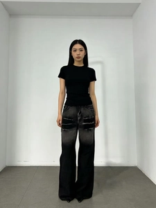 Women's vintage black washed distressed wide leg jeans with street style ripped details