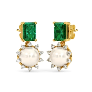 Detail of emerald cut green stone and pearl earrings with gold plating and zircon