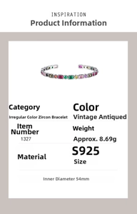Detail of silver bangle with colorful zircons, measuring 54mm inner diameter and 8.69g