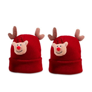 Red Christmas knit beanies with plush reindeer antlers and 3D deer design for winter