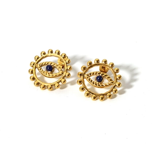 Détails de boucles d'oreilles œil porte-bonheur dorées avec pierre bleue vintage