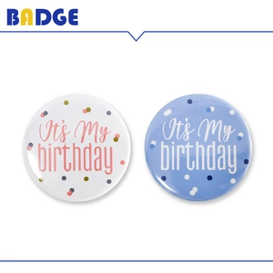 Tinplate Happy Birthday badges in blue and white with It's My Birthday text and polka dots