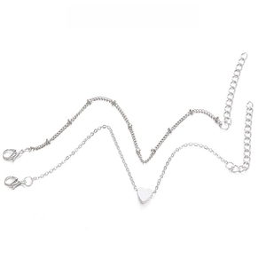 Silver bohemian heart pendant necklace set with delicate beads and lobster clasp