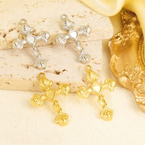 Detailed close-up of 304 stainless steel cross pendants with heart and rose motifs