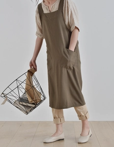 Japanese style military green linen apron with cross-back straps and large front pockets
