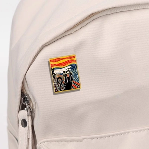 Artistic enamel cat pin mimicking The Scream painting on a canvas backpack