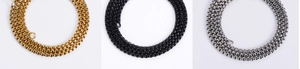 Detailed comparison of Eiffel Tower necklace chains in gold, black, and silver finishes