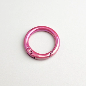 Detail of rose pink metallic spring gate carabiner ring for DIY jewelry and keychain making