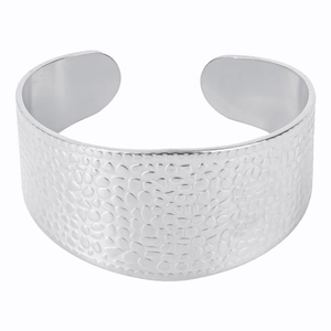 Detail shot of a silver hammered texture C-shape adjustable cuff bangle in stainless steel